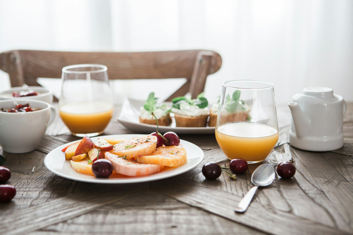 Organic breakfast with fresh juices and fruit