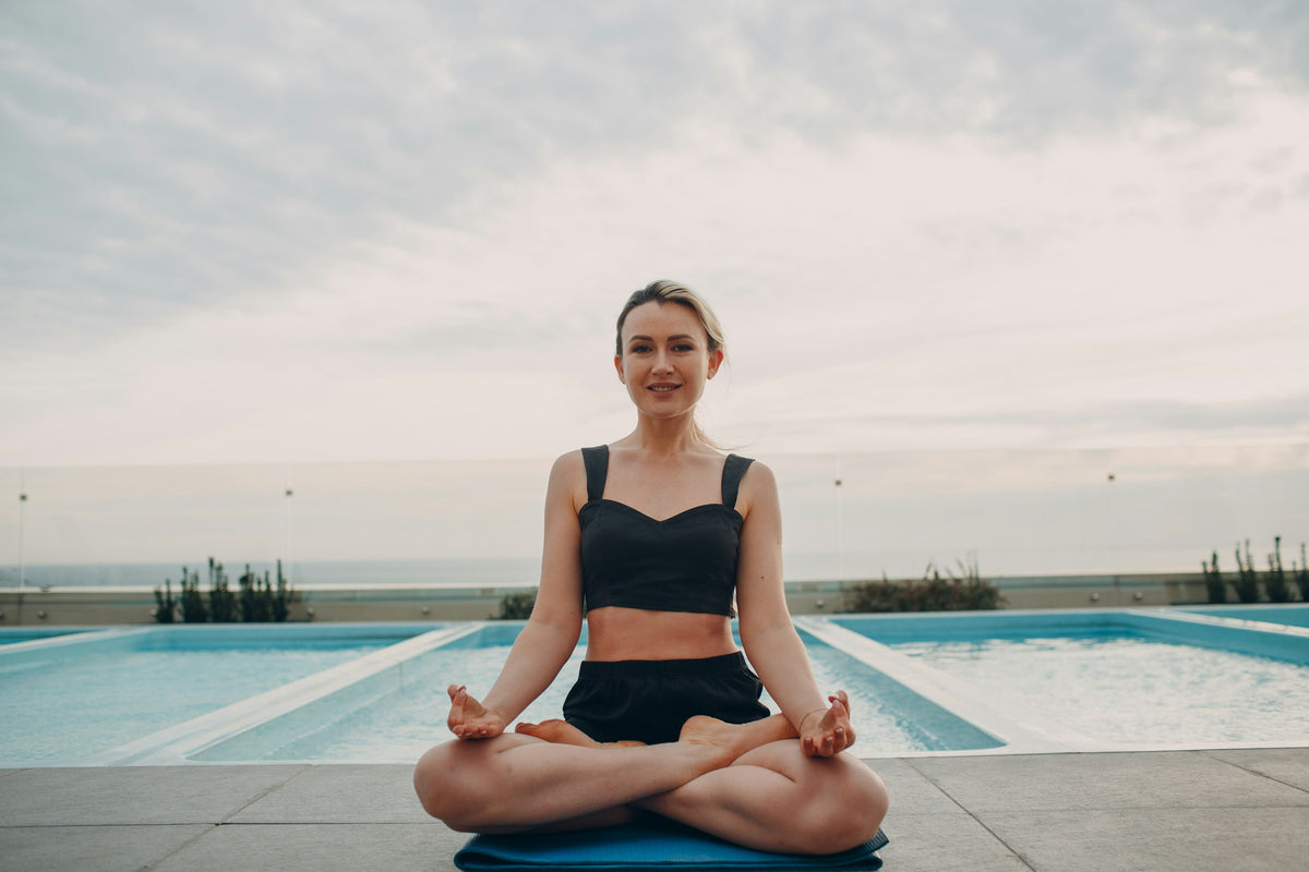 Meditation by the infinity pool above the sea